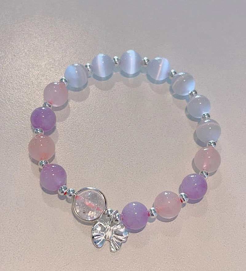 Bracelet imitation œil de chat cristal de papillon
