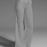 Pantalon uni jambes larges