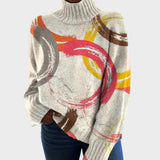 Pull col roulé crème à coups de pinceau colorés — Blanche, LucieSaint-Tropez