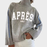 Pull col roulé gris avec inscription APRÈS ski — Héloïse, LucieSaint-Tropez