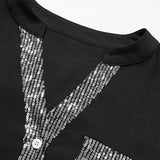 Haut décontracté à empiècements et boutons à sequins
