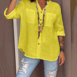 Chemise de couleur unie avec poches et boutons simples