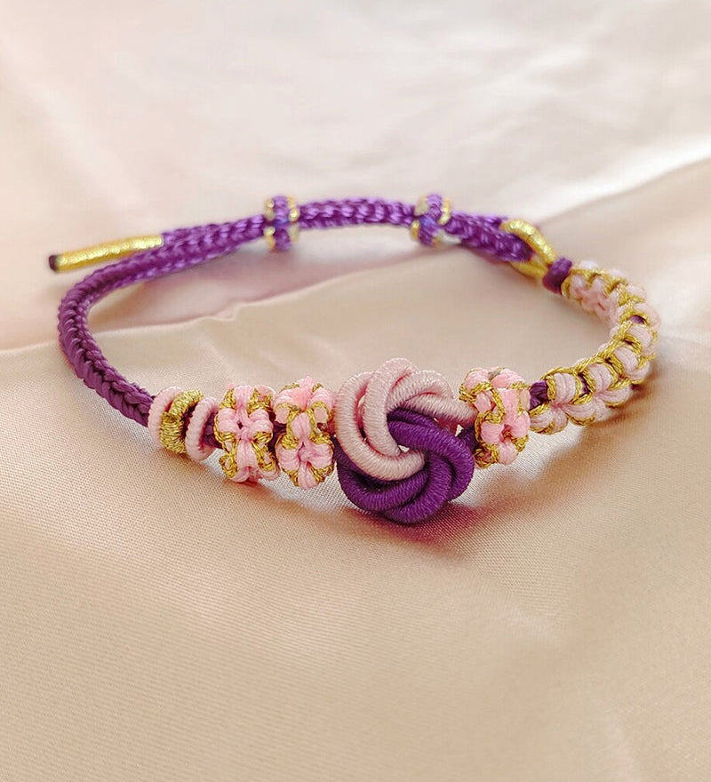 Bracelet avec noeud de fleurs de pêcher