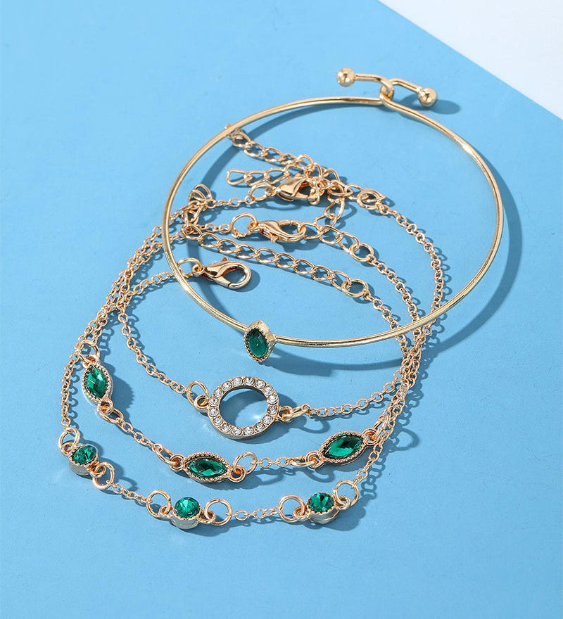 Ensemble de quatre bracelets en strass en forme de losange circulaire