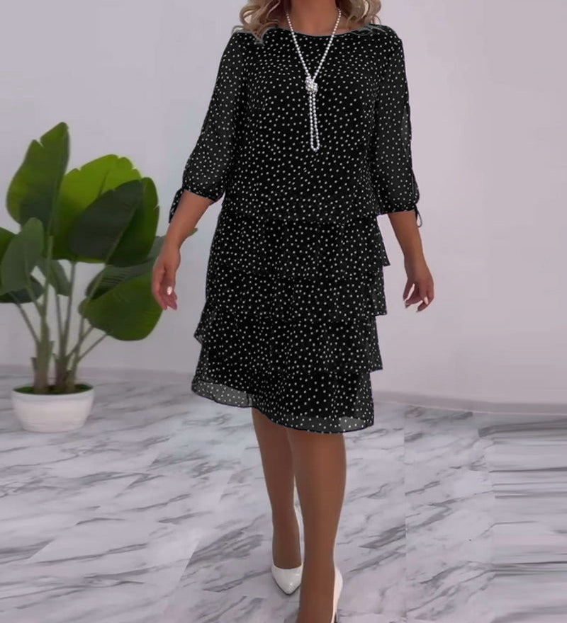 Robe élégante superposée à imprimé pois