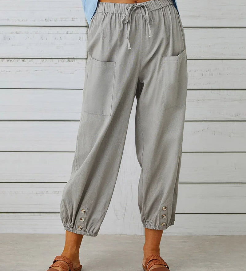 Pantalon taille haute bouton neuf points