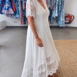 Robe fluide boutonnée en V profond