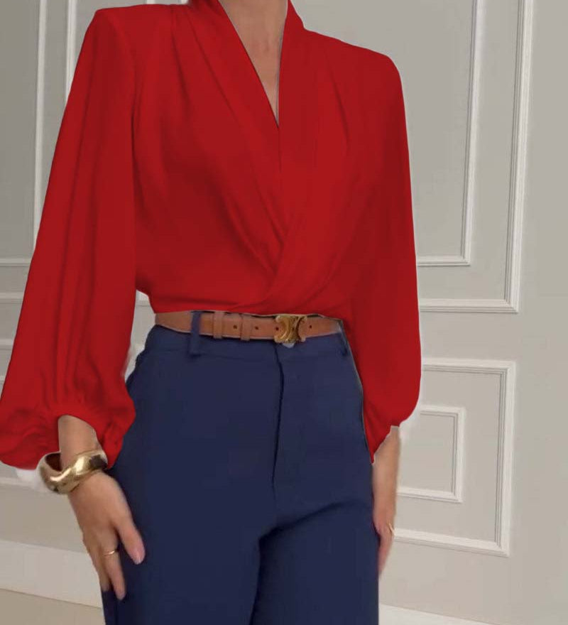 Chemisier tendance à manches lanternes et col en V de couleur unie