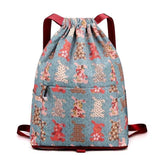 Sac à bandoulière avec cordon de serrage de style ethnique