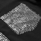 Haut décontracté à empiècements et boutons à sequins