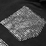 Haut décontracté à empiècements et boutons à sequins
