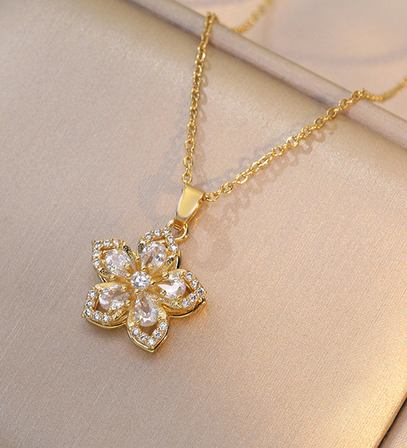 Collier pendentif rotatif à 360° à cinq pétales de fleur