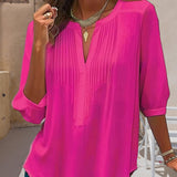 Blouse unie plissée col V