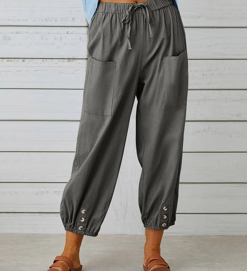 Pantalon taille haute bouton neuf points