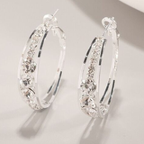 Grandes boucles d'oreilles créoles incrustées de strass