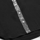 Haut décontracté à empiècements et boutons à sequins