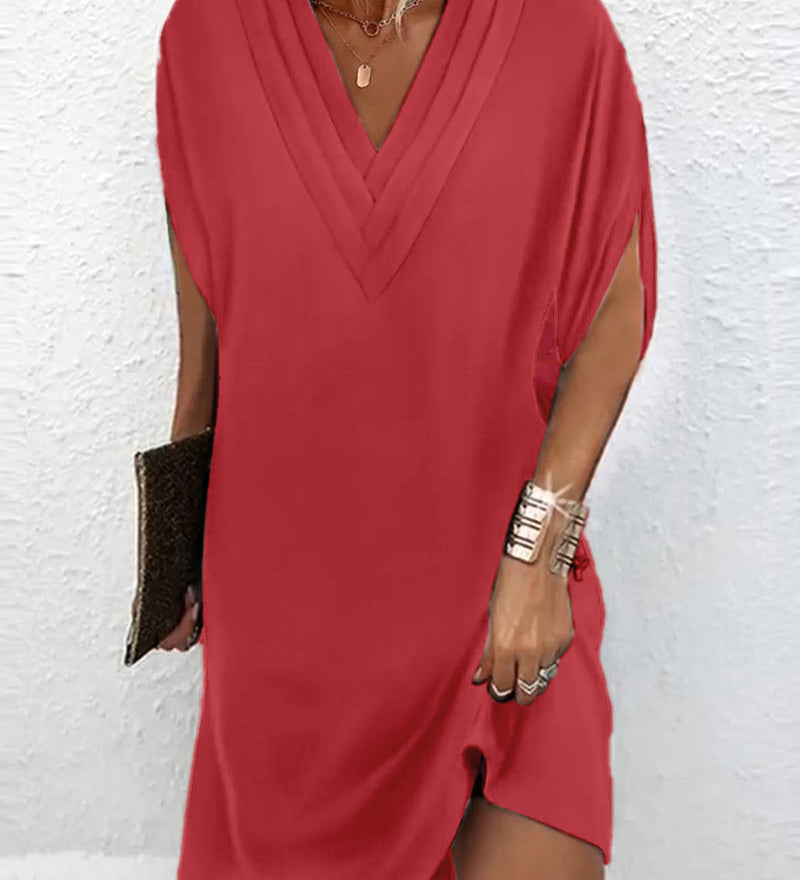 Robe élégante à manches fendues de couleur unie