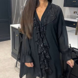 Blouse à volants et style élégant