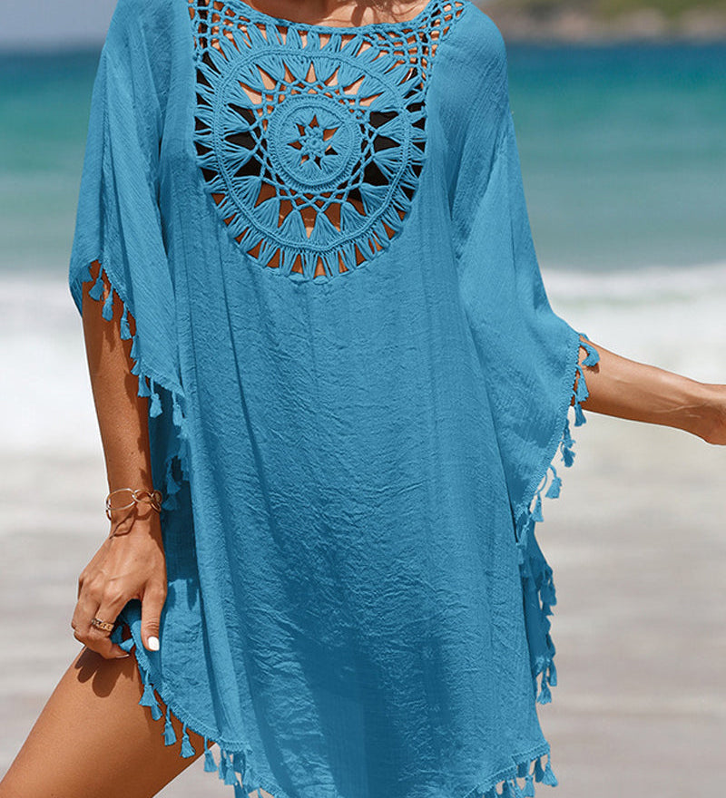 Couverture de plage avec pompons