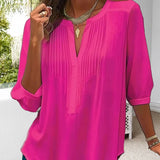 Blouse unie plissée col V