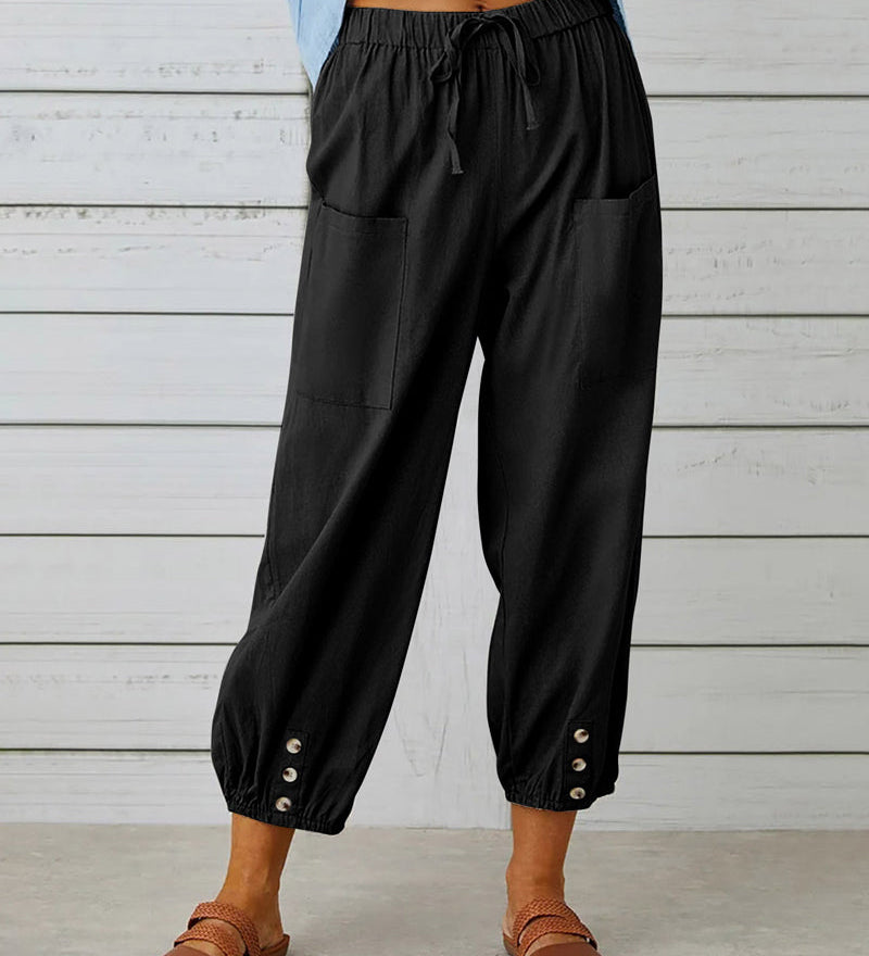 Pantalon taille haute bouton neuf points