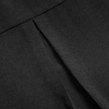 Haut décontracté à empiècements et boutons à sequins