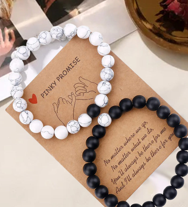 Ensemble de bracelets pour couple tissés en perles noires et blanches