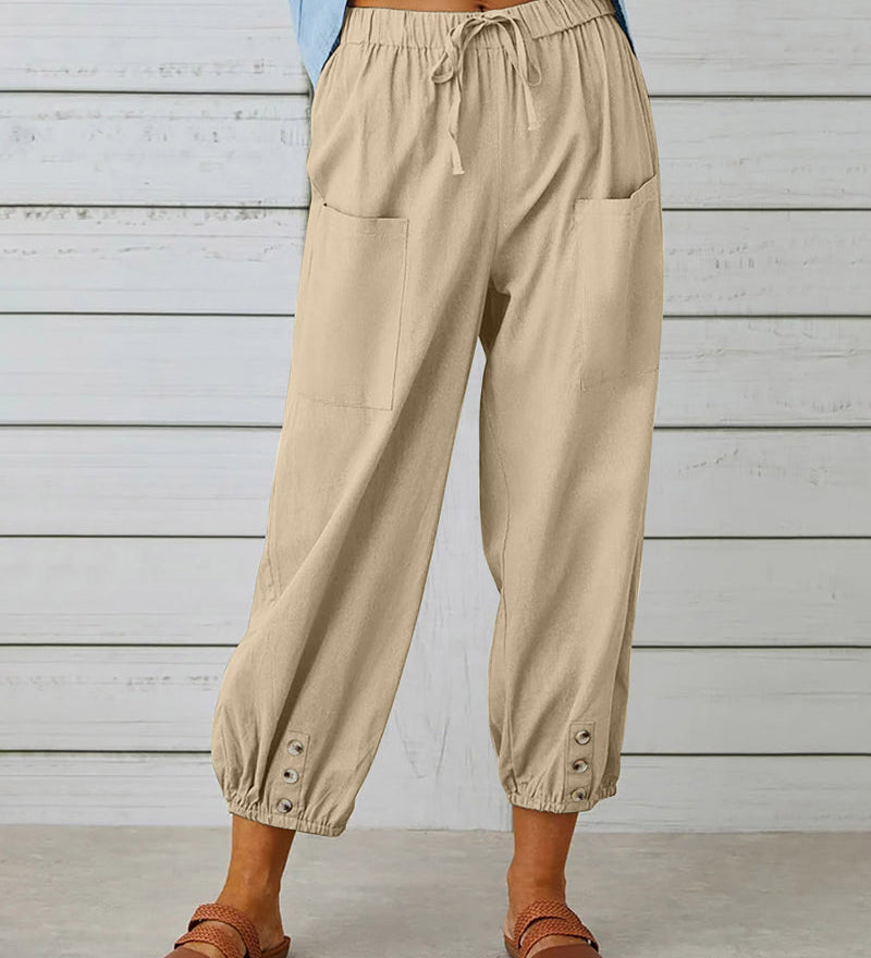 Pantalon taille haute bouton neuf points