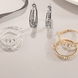 Grandes boucles d'oreilles créoles incrustées de strass