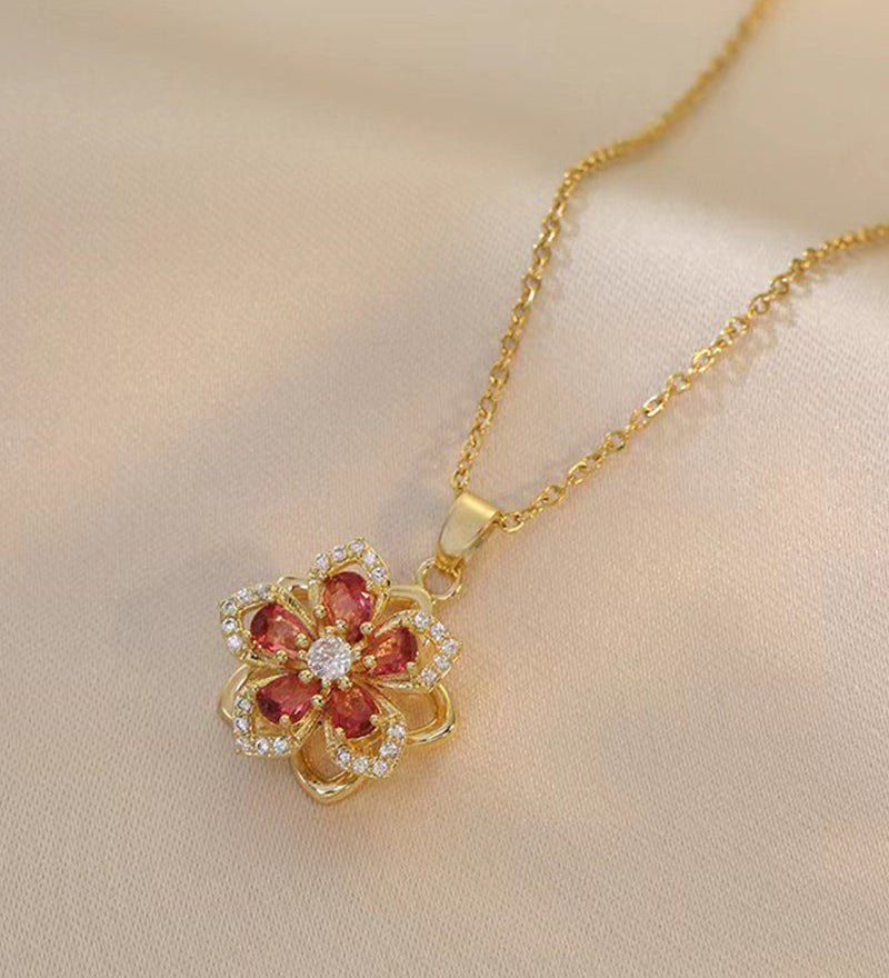 Collier pendentif rotatif à 360° à cinq pétales de fleur