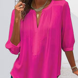 Blouse unie plissée col V