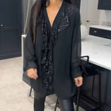 Blouse à volants et style élégant