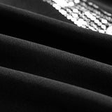 Haut décontracté à empiècements et boutons à sequins