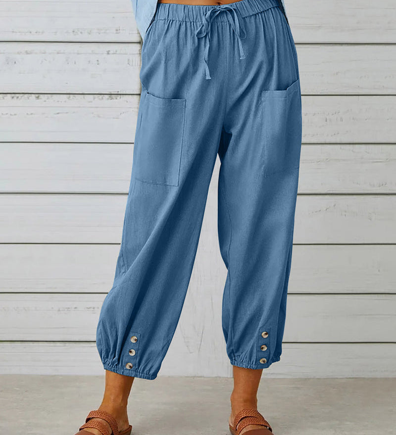 Pantalon taille haute bouton neuf points