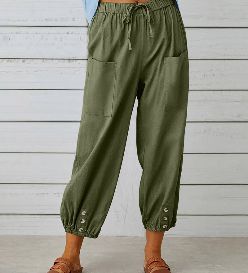 Pantalon taille haute bouton neuf points
