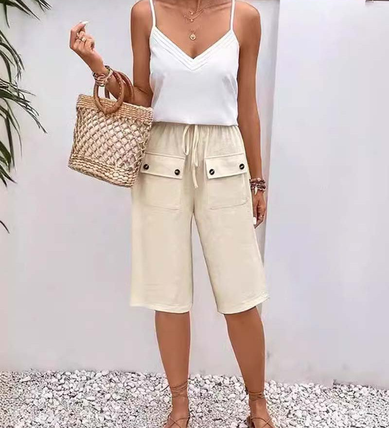 Pantalon mi-long décontracté avec poche de couleur unie