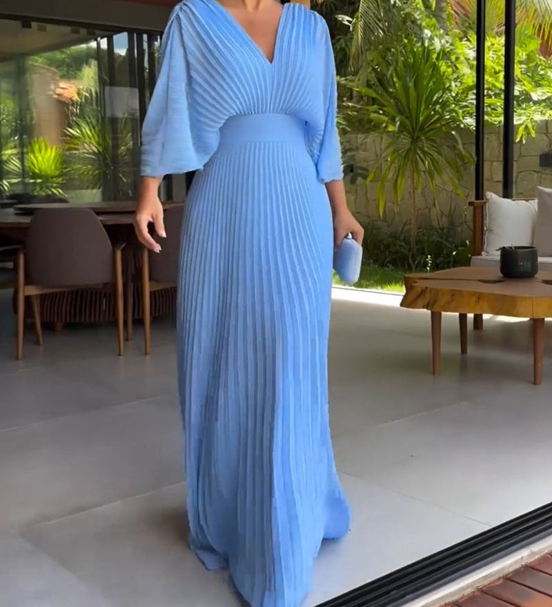Robe à plis et taille cintrée