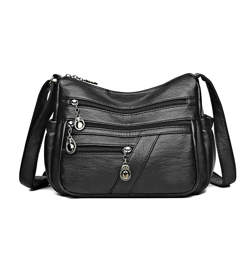 Sac bandoulière en cuir souple avec multipoches
