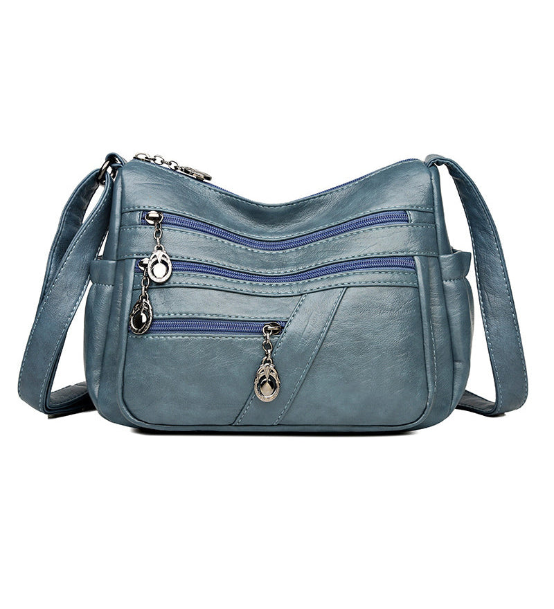 Sac bandoulière en cuir souple avec multipoches