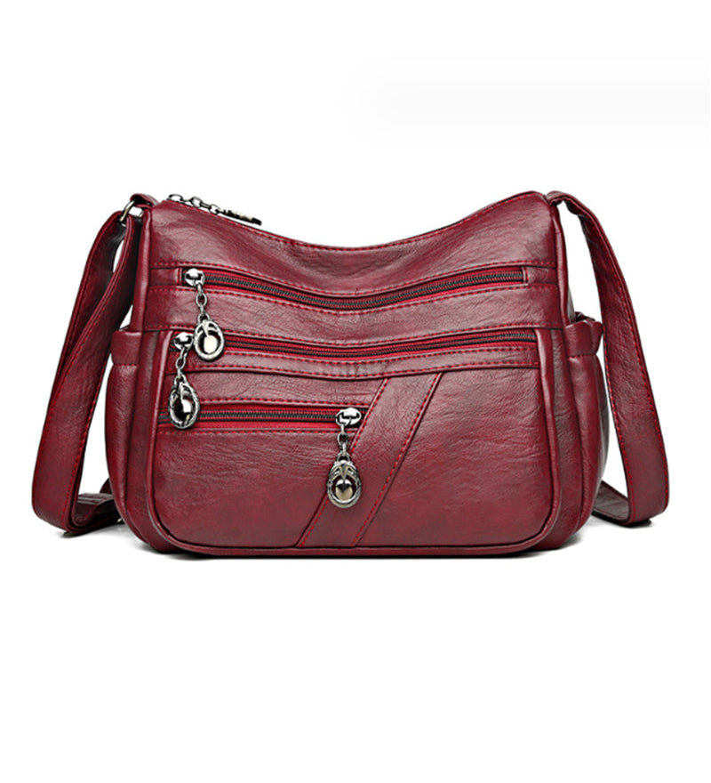 Sac bandoulière en cuir souple avec multipoches