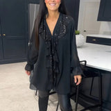 Blouse à volants et style élégant