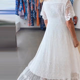 Robe fluide boutonnée en V profond