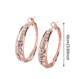 Grandes boucles d'oreilles créoles incrustées de strass