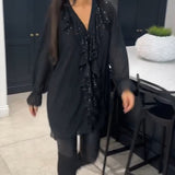 Blouse à volants et style élégant