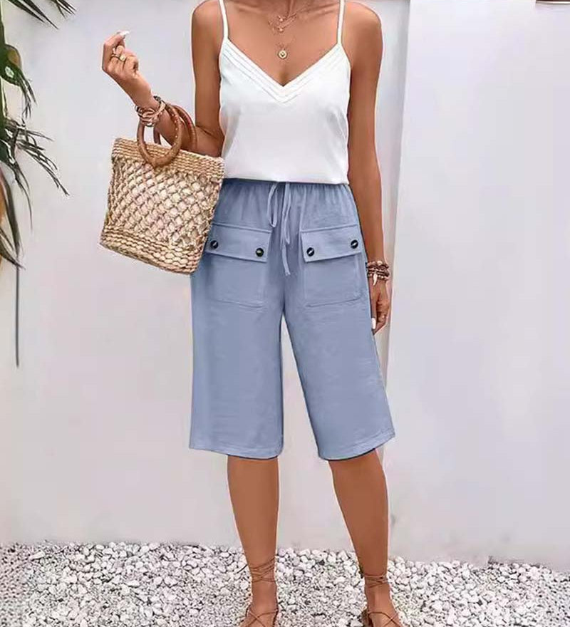 Pantalon mi-long décontracté avec poche de couleur unie