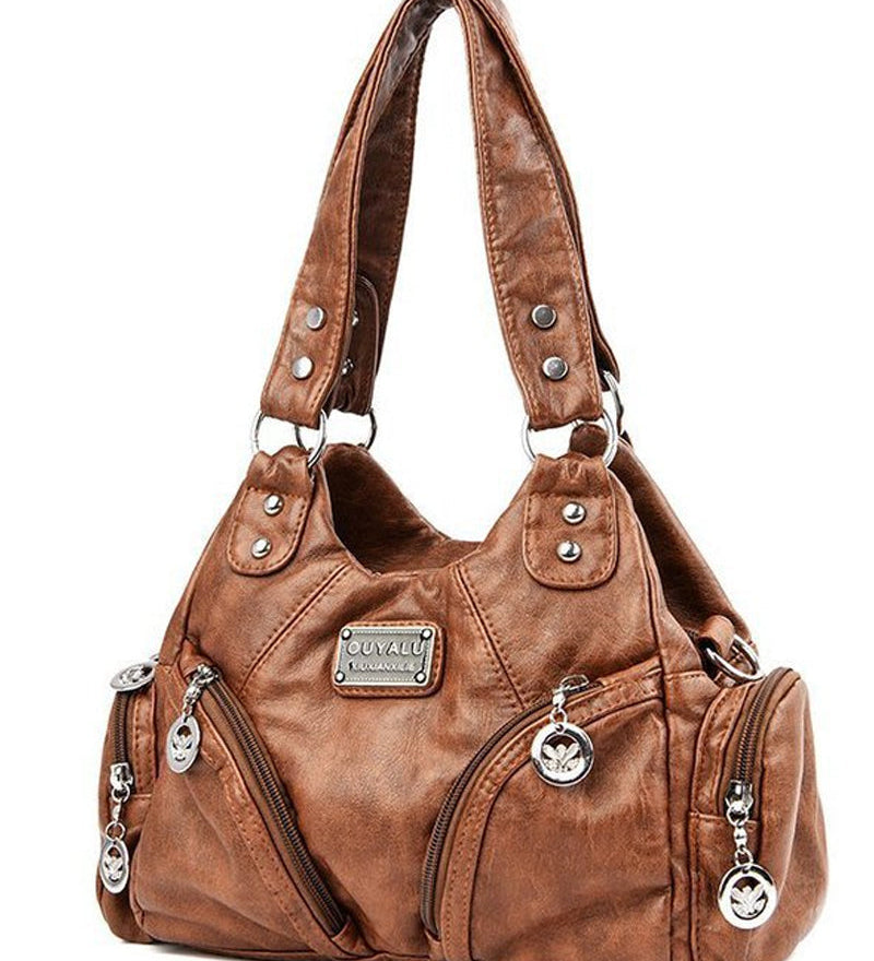 Sac à main messenger en cuir souple vintage
